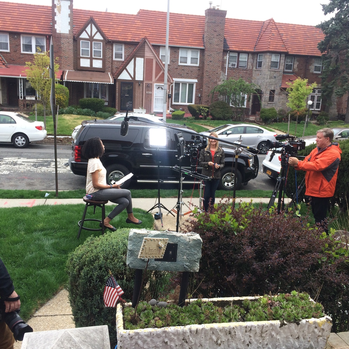 Multi-camera studio set with talent and crew