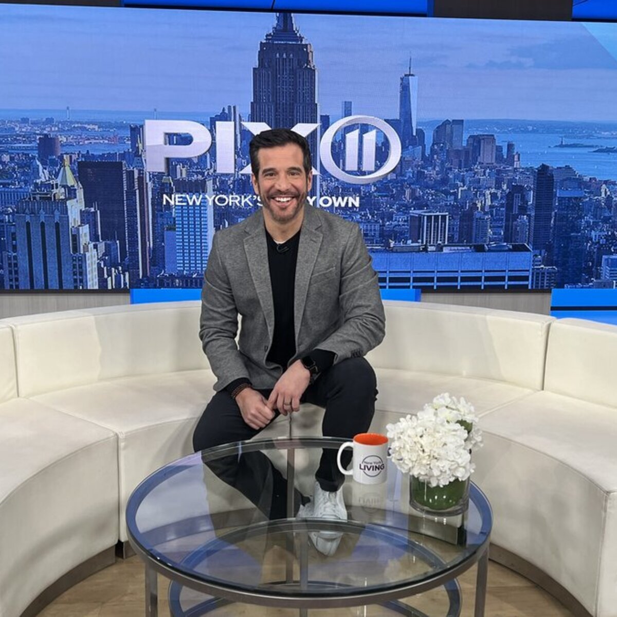 JD Roberto filming with dolphins